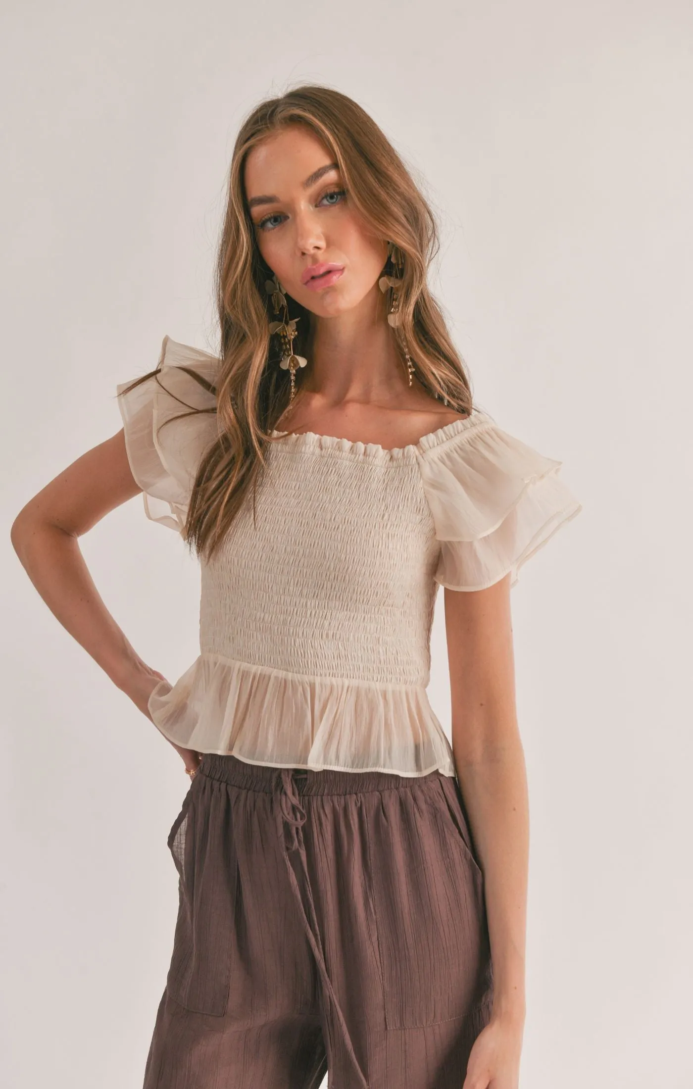 Blurred Smocked Ruffle Peplum Top